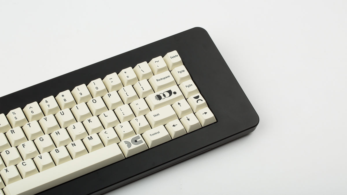  GMK CYL Creme on a black keyboard close up on right side 