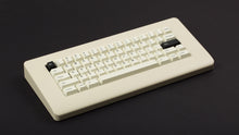 Load image into Gallery viewer, GMK CYL Creme on a beige keyboard angled