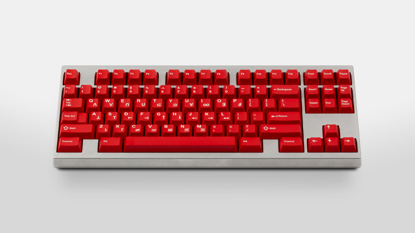 GMK CYL Crimson Cadet on a silver keyboard