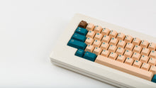 Load image into Gallery viewer, GMK Earth Tones on a beige keyboard zoomed in left