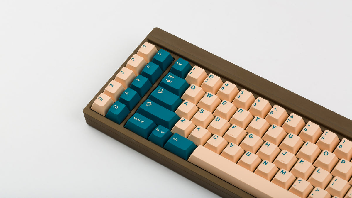  GMK Earth Tones on a brown keyboard zoomed in left 