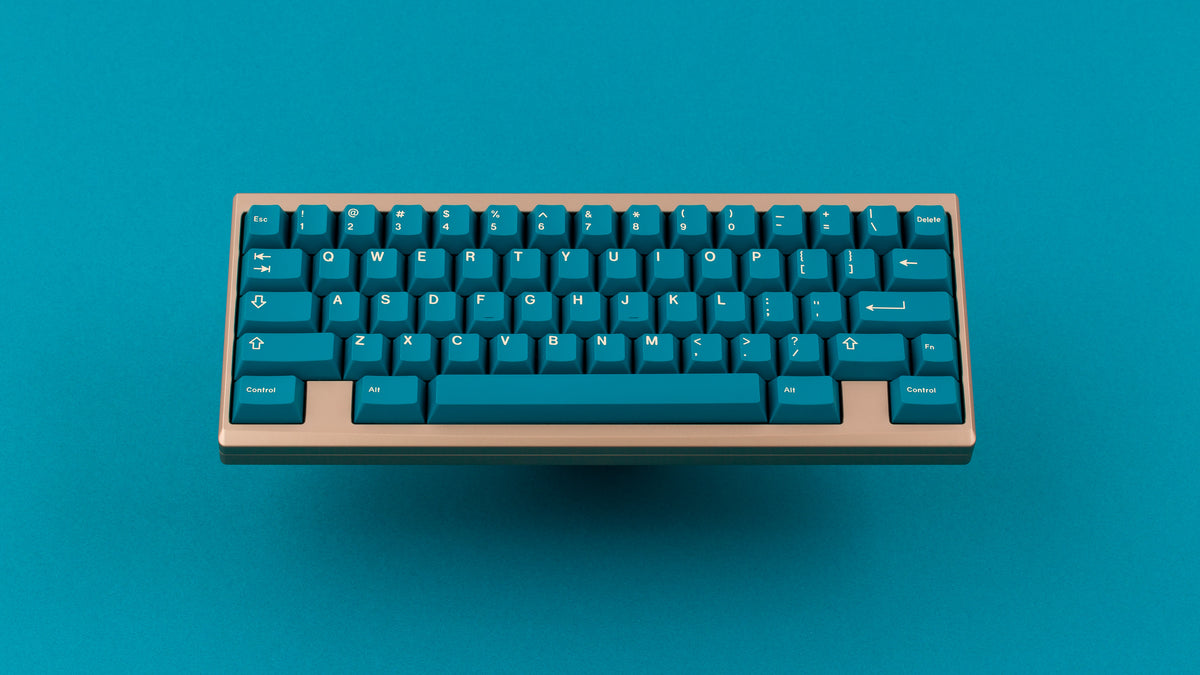 GMK Earth Tones on a gold keyboard centered 