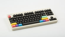 Load image into Gallery viewer, GMK CYL Extended 2048 on a Retrobright Beige CLASSIC-TKL angled