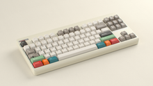 Load image into Gallery viewer, render of GMK Foundation on a beige CLASSIC-TKL angled with CYL caps