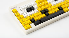 Load image into Gallery viewer, GMK CYL GREG 2 keycaps on a cream Classic TKL keyboard, left-side close-up