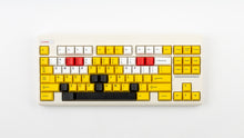 Load image into Gallery viewer, GMK CYL GREG 2 keycaps with red accent keys on a cream Classic TKL keyboard, front view