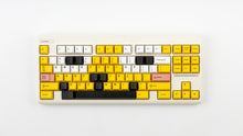 Load image into Gallery viewer, GMK CYL GREG 2 keycaps with pink accent keys on a cream Classic TKL keyboard, front view
