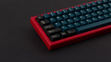 Load image into Gallery viewer, GMK CYL Gladiator on red keyboard zoomed in on left