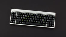 Load image into Gallery viewer, GMK CYL Grissean R2 on a silver keybaord angled