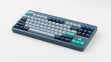 Load image into Gallery viewer, GMK CYL Hammerhead Small Batch keycaps on slate blue TKL keyboard, elevated three-quarter view showing full layout