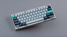 Load image into Gallery viewer, GMK CYL Hammerhead Small Batch keycaps on silver 65% keyboard, top-down full board view on grey background