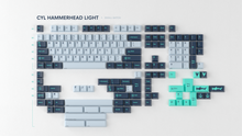 Load image into Gallery viewer, render of GMK CYL Hammerhead Small Batch kit featuring light blue-grey alphas, dark navy modifiers, and teal accent keys with shark and anchor novelties