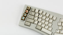 Load image into Gallery viewer, GMK CYL Hineybeige on a beige Type K keyboard close up on left