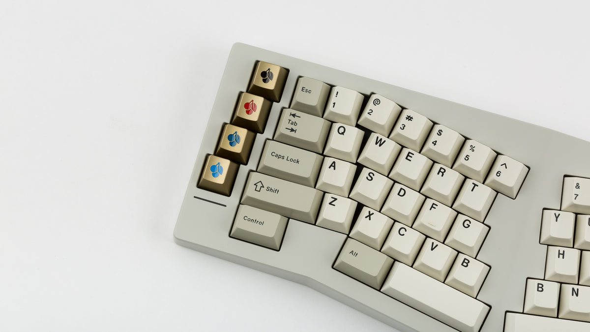  GMK CYL Hineybeige on a beige Type K keyboard close up on left 