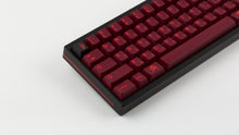 Load image into Gallery viewer, GMK CYL Infernal on a black keyboard zoomed in left side