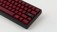 Load image into Gallery viewer, GMK CYL Infernal on a black keyboard zoomed in on right