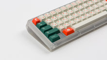 Load image into Gallery viewer, GMK CYL Kaiju Part Deux on translucent keyboard zoomed in on left
