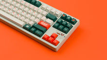 Load image into Gallery viewer, GMK CYL Kaiju Part Deux on speckled beige keyboard zoomed in on right