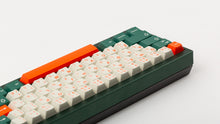 Load image into Gallery viewer, GMK CYL Kaiju R3 hiragana base keycaps rear angle on dark green full-size keyboard