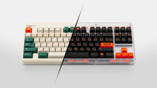 Load image into Gallery viewer, GMK CYL Kaiju R3 keycap set split comparison, hiragana base on beige keyboard and dark base on clear keyboard