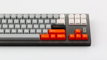 Load image into Gallery viewer, GMK CYL Mars Cadet on a grey keyboard close up on right side