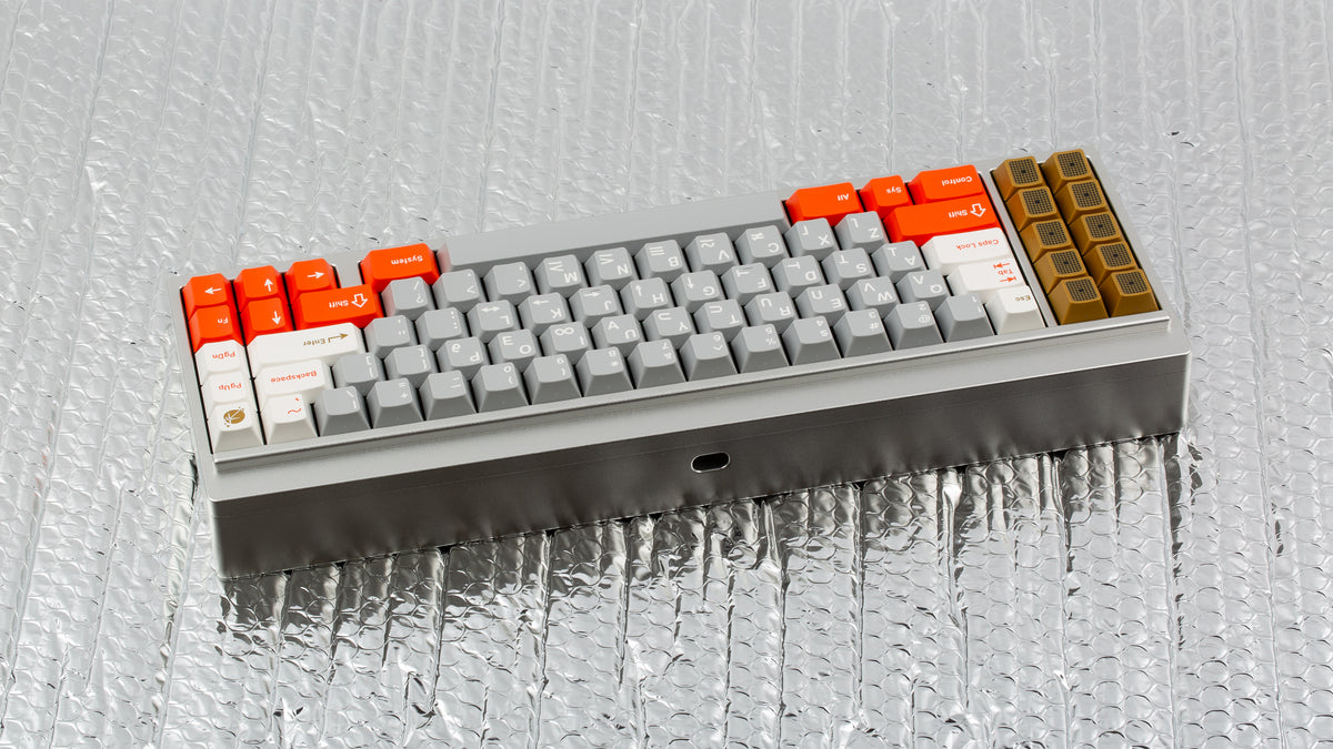  GMK CYL Mars Cadet on a silver keyboard back view angled 