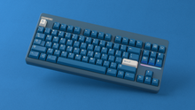 Load image into Gallery viewer, render of GMK CYL Masterpiece R2 keycaps on navy blue Classic TKL keyboard, wide view