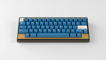 Load image into Gallery viewer, render of GMK CYL Masterpiece R2 keycaps on gold Zero keyboard with Latin legends, frontal view