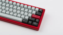 Load image into Gallery viewer, GMK CYL Mercury on red keyboard zoomed in on right
