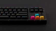 Load image into Gallery viewer, GMK CYL Mictlan on a black confetti finish keyboard right side
