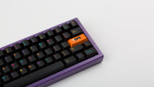 Load image into Gallery viewer, GMK CYL Mictlan on a purple keyboard zoomed in on right
