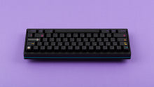 Load image into Gallery viewer, GMK CYL Mictlan on a black keyboard back view