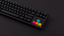 Load image into Gallery viewer, GMK CYL Mictlan on a black confetti finish keyboard right side