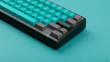 Load image into Gallery viewer, GMK CYL Hatsune Miku on a black Keycult Zero close up on right side