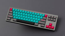 Load image into Gallery viewer, GMK CYL Hatsune Miku on a grey keyboard angled