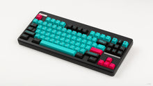 Load image into Gallery viewer, GMK CYL Hatsune Miku on a black CLASSIC-TKL angled