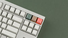 Load image into Gallery viewer, CYL Modern Materials concrete on a silver keyboardclose up on right