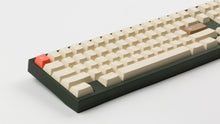 Load image into Gallery viewer, CYL Modern Materials stone on a green keyboard close up on left