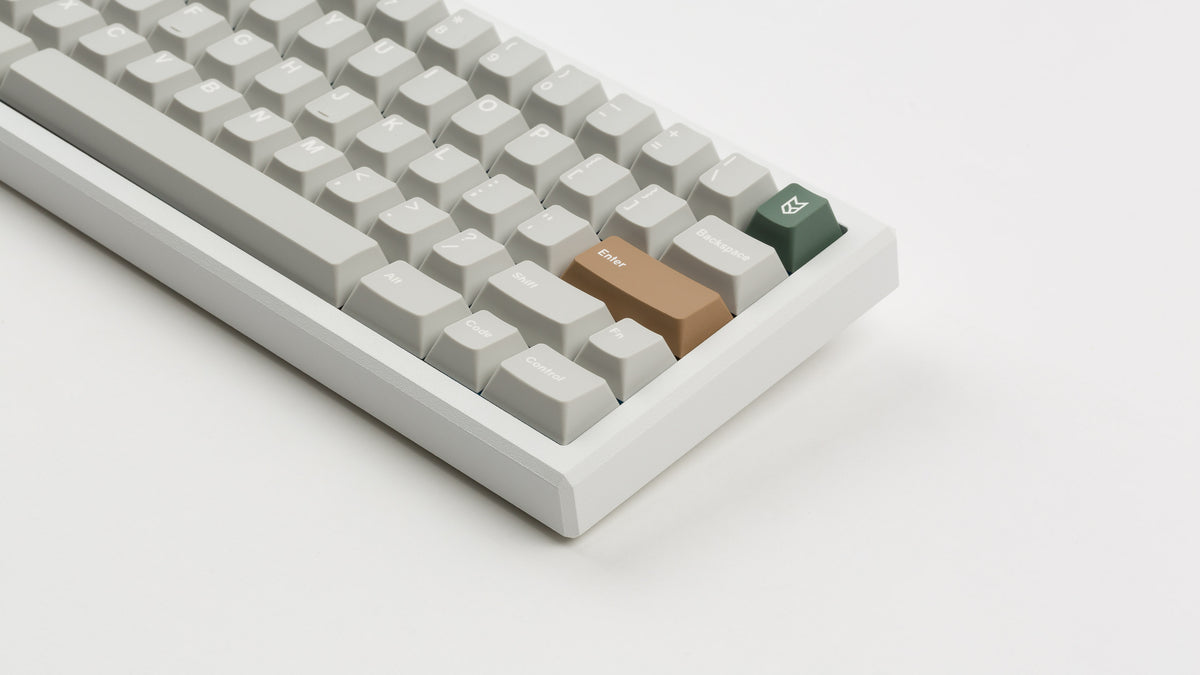  CYL Modern Materials concrete on a white keyboard close up on right 