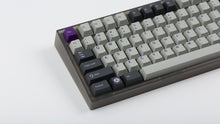 Load image into Gallery viewer, GMK CYK NTD on smoke NK87 keyboard zoomed in on left