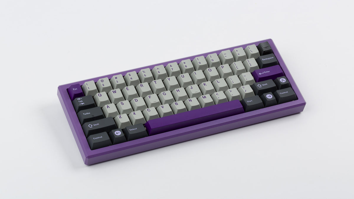  GMK CYK NTD on purple keyboard angled 