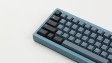 Load image into Gallery viewer, GMK CYL Nord on a blue keyboard close up on left side