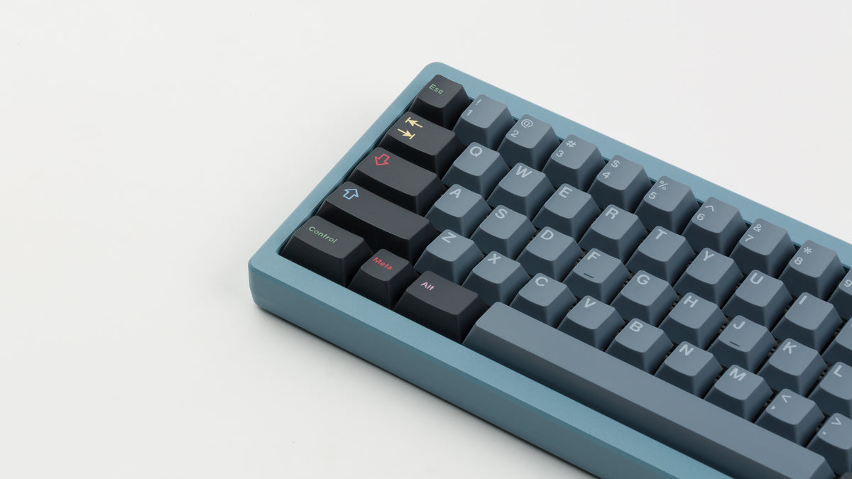  GMK CYL Nord on a blue keyboard close up on left side 