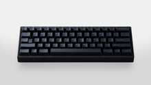 Load image into Gallery viewer, hidden - GMK CYL PoB black keycaps with subtle purple legends on black 60% keyboard