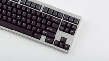 Load image into Gallery viewer, GMK CYL Regal on silver keyboard zoomed in on right