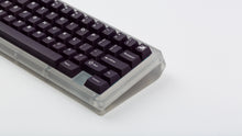 Load image into Gallery viewer, GMK CYL Regal on translucent keyboard zoomed in on right
