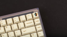 Load image into Gallery viewer, GMK CYL Rainbow 6 Siege - Winner&#39;s Circle on a Clear PC keyboard close up of top right