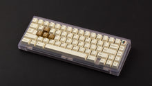 Load image into Gallery viewer, GMK CYL Rainbow 6 Siege - Winner&#39;s Circle on a Clear PC keyboard angled