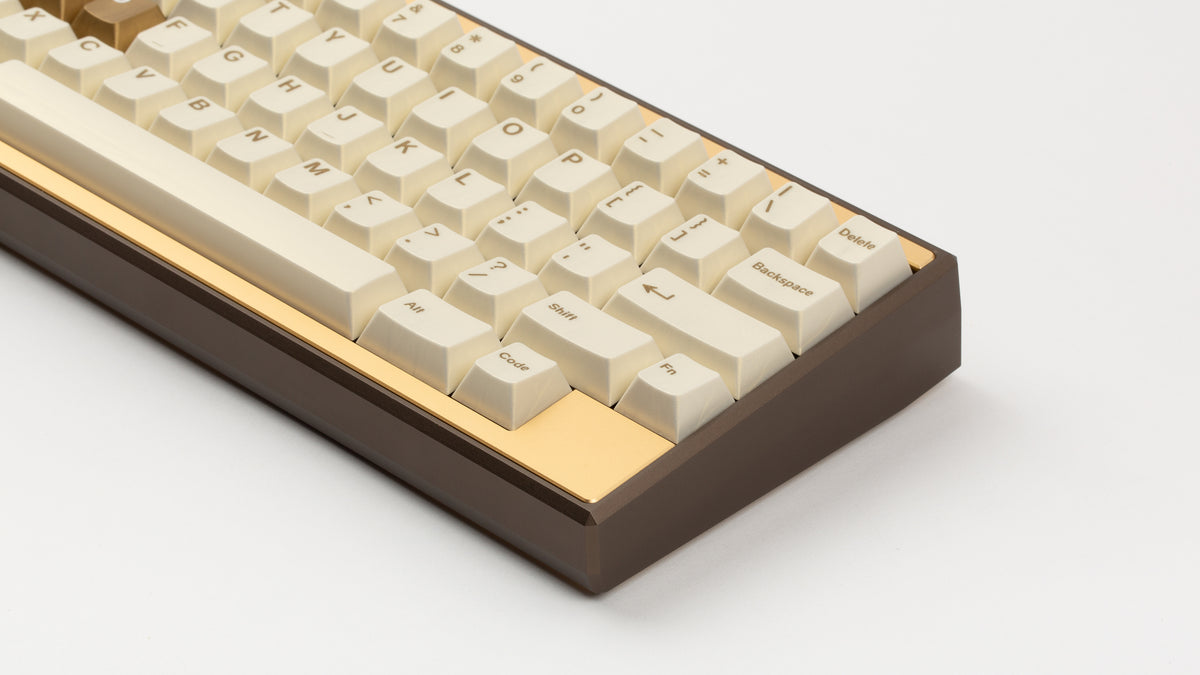  GMK CYL Rainbow 6 Siege - Winner's Circle on a Dark Gold Keycult Zero with Gold HHKB accent bars close up on right side angled 