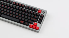 Load image into Gallery viewer, GMK CYL Slasher on a grey 7V zoomed in on right